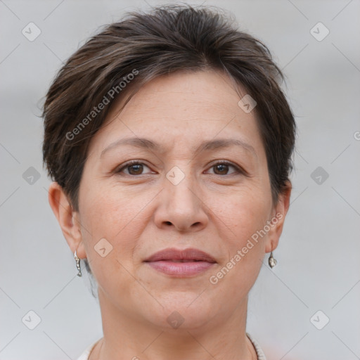 Joyful white adult female with short  brown hair and brown eyes