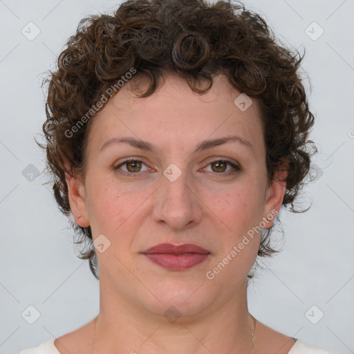 Joyful white young-adult female with medium  brown hair and green eyes