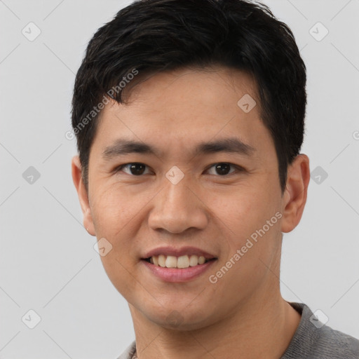 Joyful white young-adult male with short  black hair and brown eyes