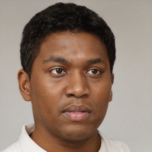 Neutral black young-adult male with short  brown hair and brown eyes