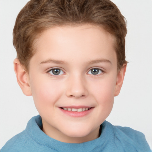 Joyful white child female with short  brown hair and grey eyes