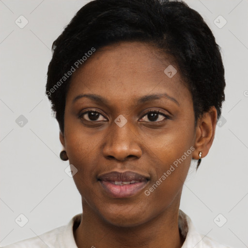 Joyful black adult female with short  black hair and brown eyes