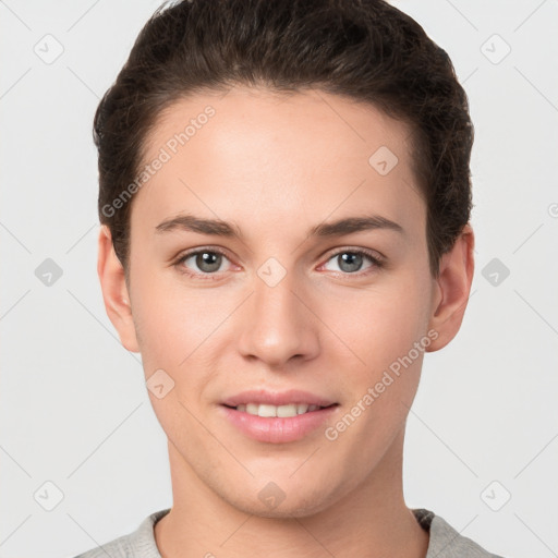 Joyful white young-adult female with short  brown hair and brown eyes