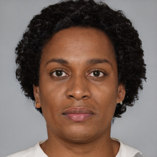 Neutral black young-adult female with short  brown hair and brown eyes