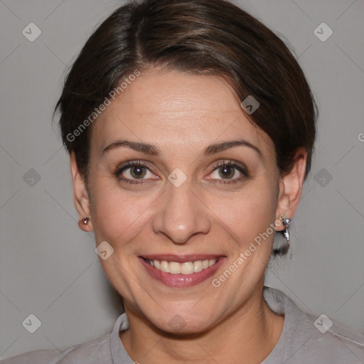 Joyful white adult female with short  brown hair and brown eyes