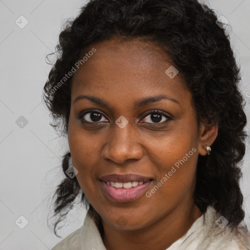 Joyful black young-adult female with medium  brown hair and brown eyes