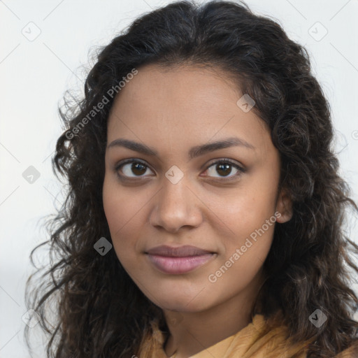 Joyful latino young-adult female with long  brown hair and brown eyes