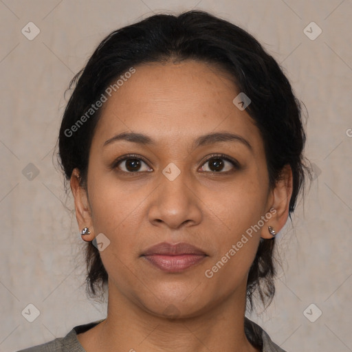 Joyful latino young-adult female with medium  black hair and brown eyes