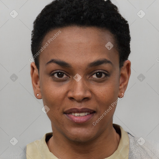 Joyful black young-adult female with short  black hair and brown eyes