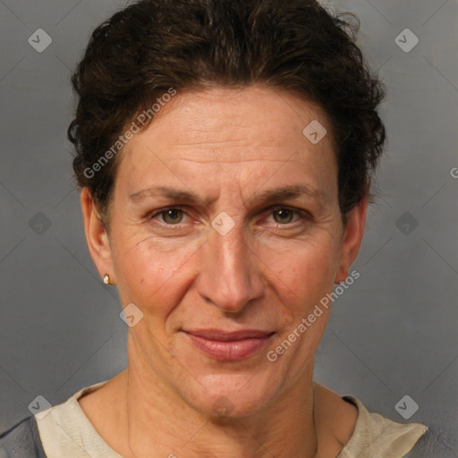 Joyful white adult female with short  brown hair and brown eyes