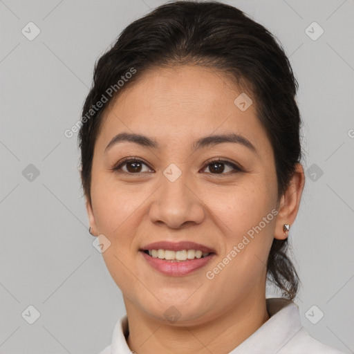 Joyful asian young-adult female with medium  brown hair and brown eyes