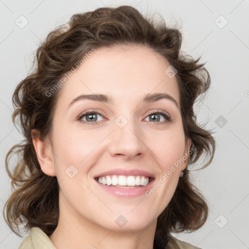 Joyful white young-adult female with medium  brown hair and green eyes