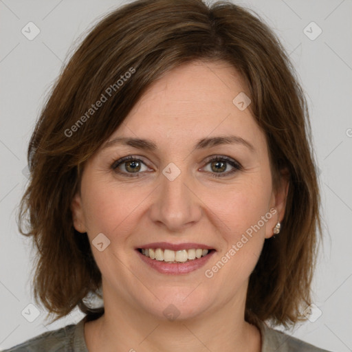 Joyful white young-adult female with medium  brown hair and green eyes