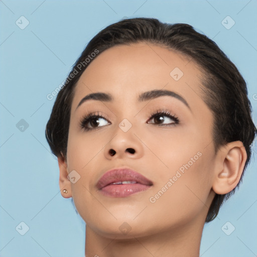 Joyful latino young-adult female with short  brown hair and brown eyes