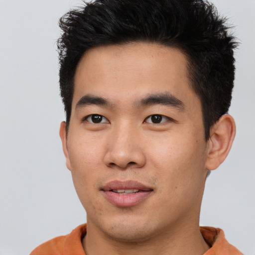 Neutral asian young-adult male with short  brown hair and brown eyes