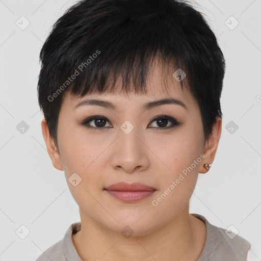 Joyful asian young-adult female with short  brown hair and brown eyes