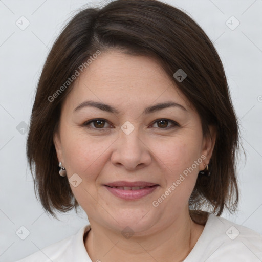 Joyful white adult female with medium  brown hair and brown eyes