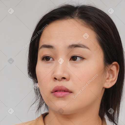 Neutral asian young-adult female with medium  brown hair and brown eyes