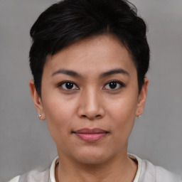 Joyful asian young-adult female with short  black hair and brown eyes