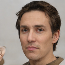 Neutral white adult male with short  brown hair and brown eyes