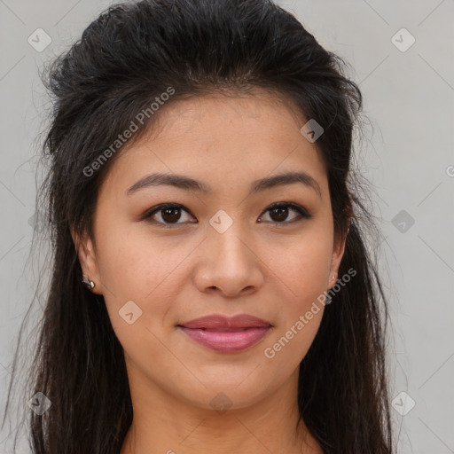 Joyful asian young-adult female with long  brown hair and brown eyes