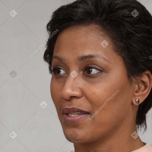 Neutral latino adult female with short  brown hair and brown eyes