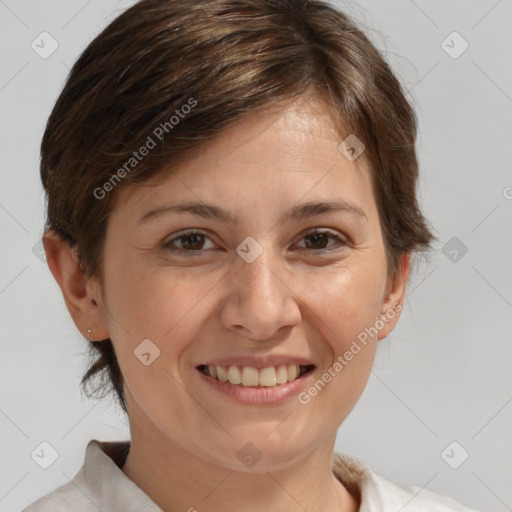 Joyful white adult female with medium  brown hair and brown eyes