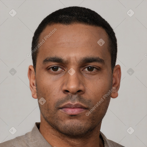 Neutral latino young-adult male with short  black hair and brown eyes
