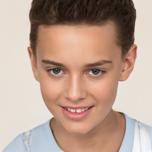 Joyful white child female with short  brown hair and brown eyes