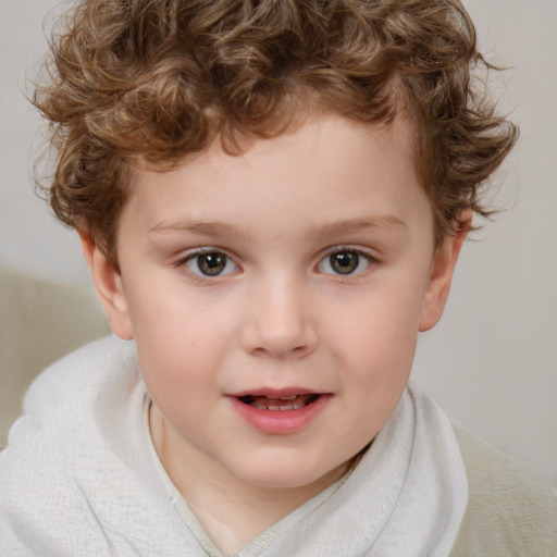 Joyful white child male with short  brown hair and brown eyes