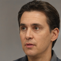 Neutral white adult male with short  brown hair and brown eyes