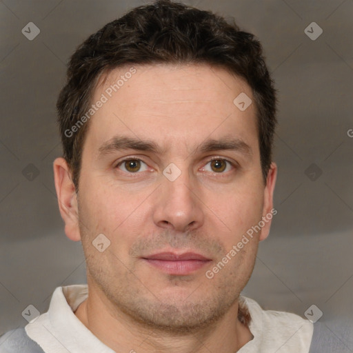 Joyful white adult male with short  brown hair and brown eyes