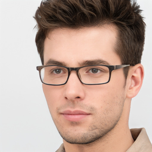 Neutral white young-adult male with short  brown hair and grey eyes