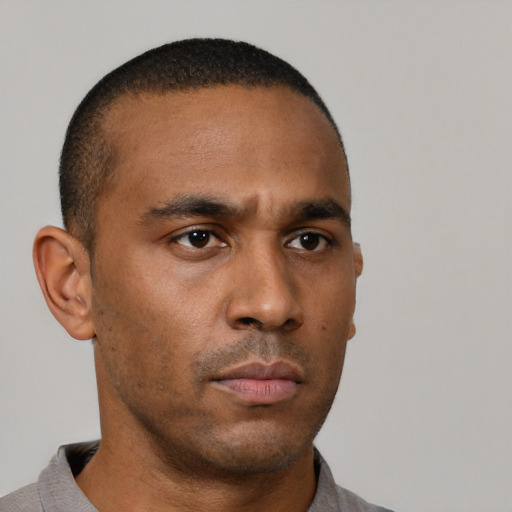 Neutral black young-adult male with short  brown hair and brown eyes