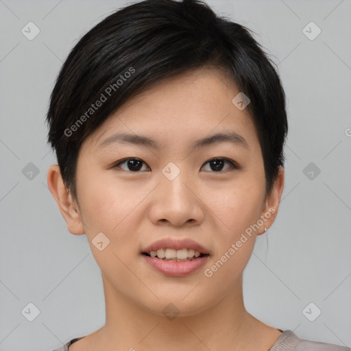 Joyful asian young-adult female with short  brown hair and brown eyes