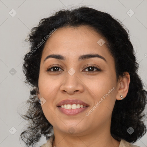 Joyful latino young-adult female with long  brown hair and brown eyes