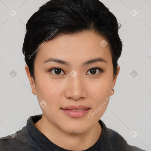 Joyful asian young-adult female with short  brown hair and brown eyes