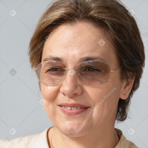 Joyful white adult female with medium  brown hair and brown eyes