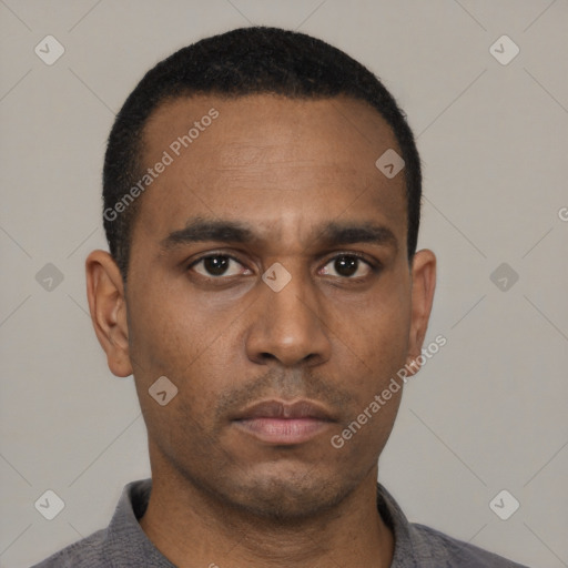 Neutral latino young-adult male with short  black hair and brown eyes