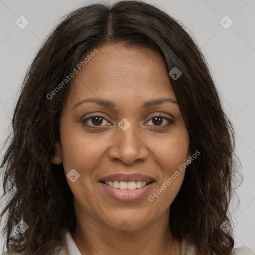 Joyful black young-adult female with medium  brown hair and brown eyes