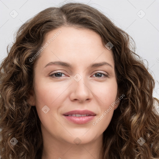 Joyful white young-adult female with long  brown hair and green eyes