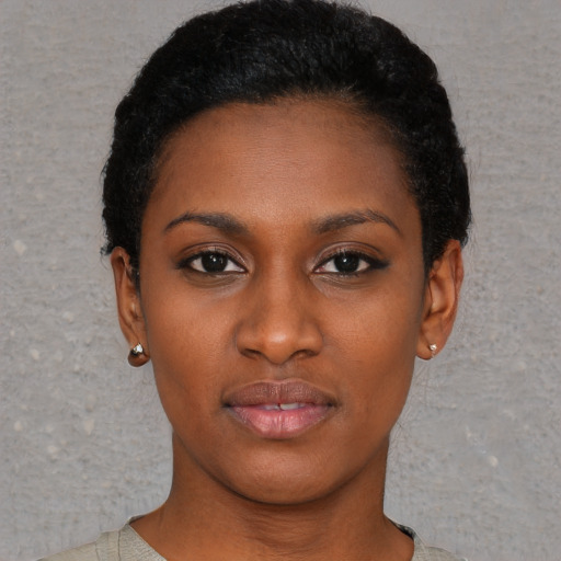 Neutral black young-adult female with short  black hair and brown eyes