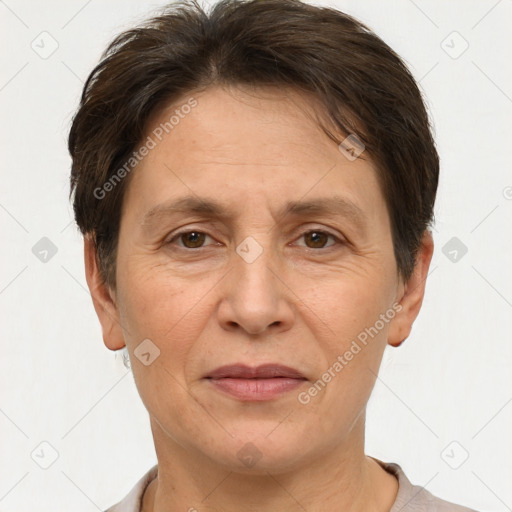 Joyful white adult female with short  brown hair and brown eyes