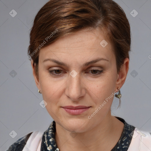 Joyful white adult female with medium  brown hair and brown eyes