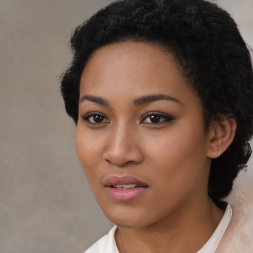 Neutral latino young-adult female with short  black hair and brown eyes