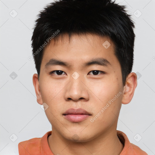 Neutral asian young-adult male with short  brown hair and brown eyes