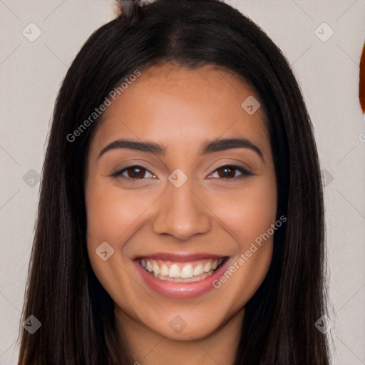 Joyful white young-adult female with long  black hair and brown eyes