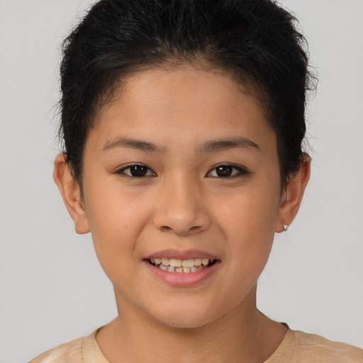 Joyful white child female with short  brown hair and brown eyes