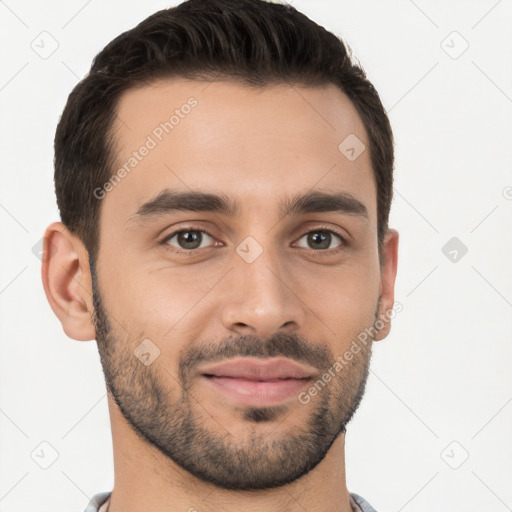 Joyful white young-adult male with short  brown hair and brown eyes