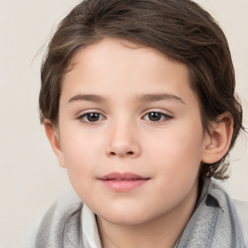 Joyful white child female with medium  brown hair and brown eyes